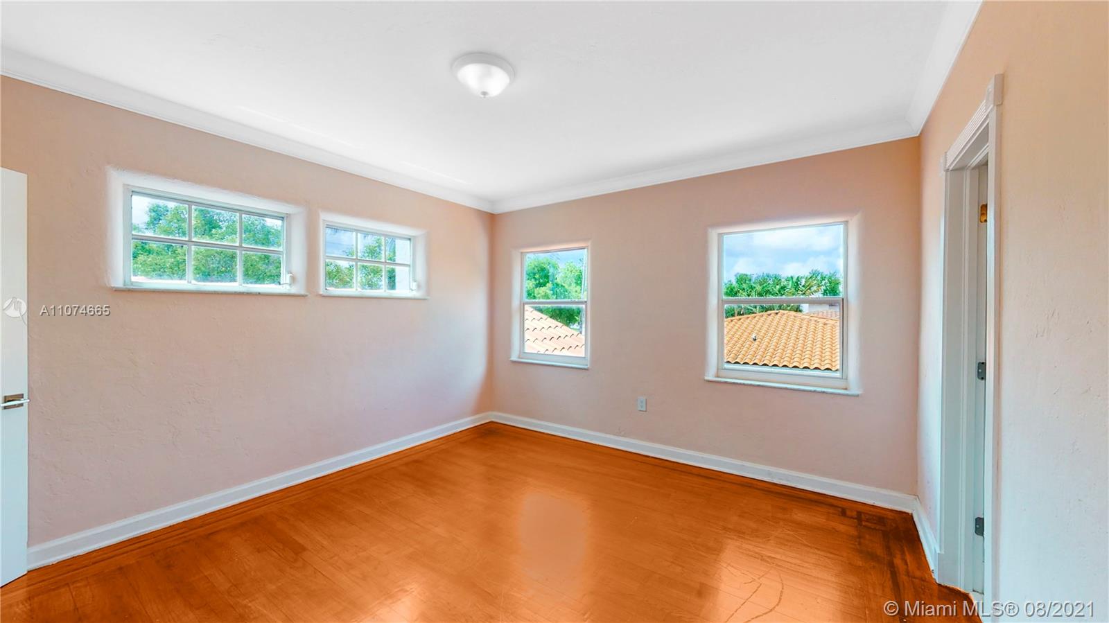 2032 Alton Road Miami Beach, FL 33140 - Photo 21 of 35 an empty room with windows