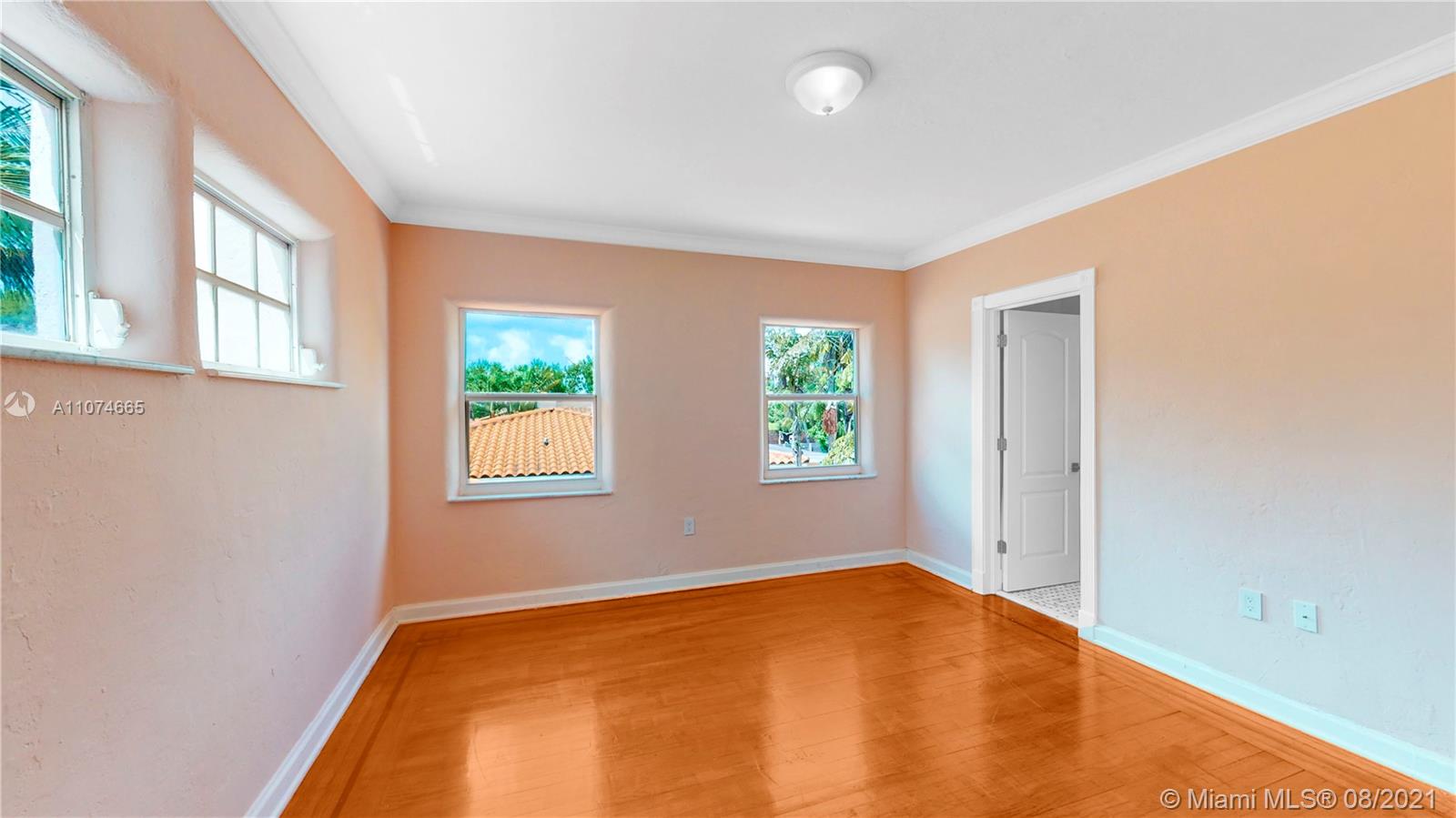 2032 Alton Road Miami Beach, FL 33140 - Photo 22 of 35 a view of a bedroom with window