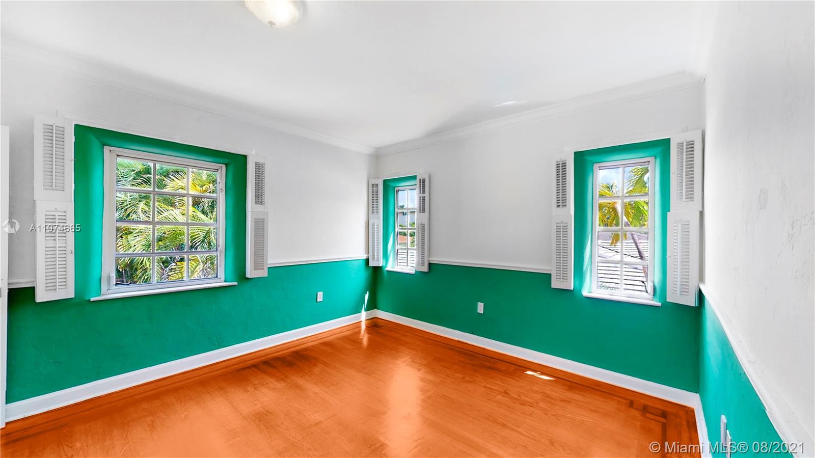 2032 Alton Road Miami Beach, FL 33140 - Photo 25 of 35 a view of an empty room with window and toys