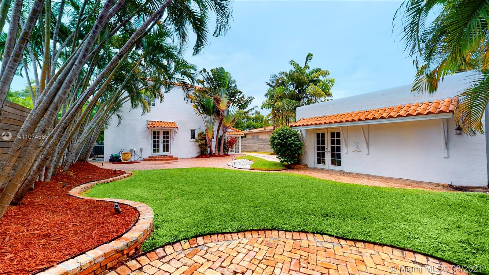 2032 Alton Road Miami Beach, FL 33140 - Photo 30 of 35 a view of backyard with a garden