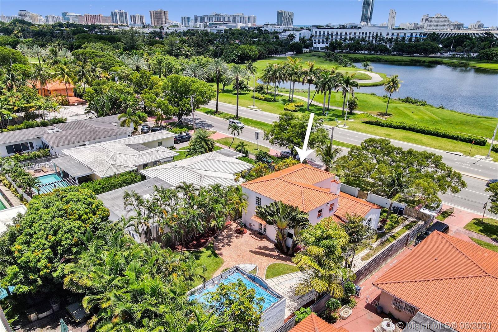 2032 Alton Road Miami Beach, FL 33140 - Photo 32 of 35 an aerial view of a house with a garden and lake view