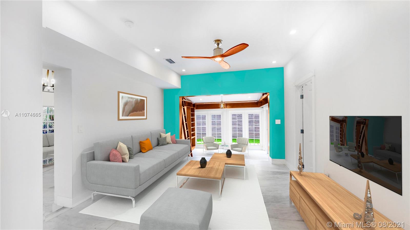 2032 Alton Road Miami Beach, FL 33140 - Photo 9 of 35 a living room with furniture and a flat screen tv