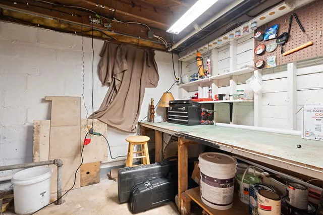 a kitchen with a sink cabinets and appliances
