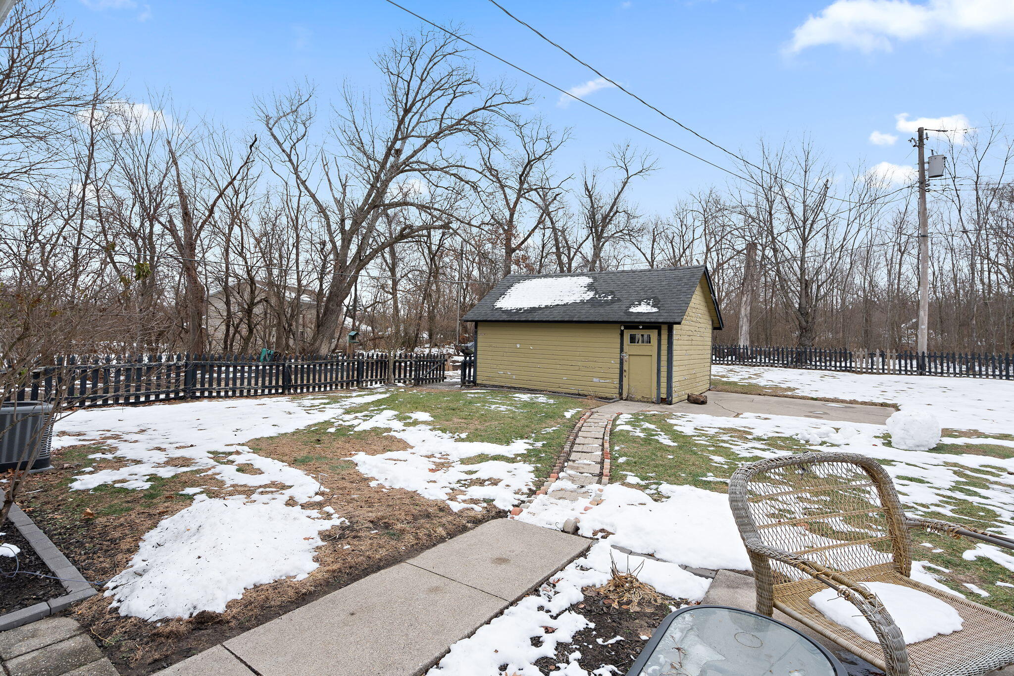 601 Azalea Street Southeast Demotte, IN 46310 - Photo 22 of 29 a view of a backyard of snow