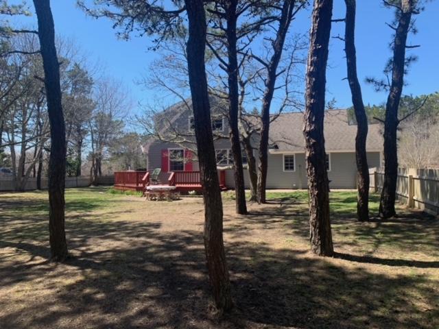 87 Massasoit Road Wellfleet, MA 02667 - Photo 18 of 26 a view of a yard with trees