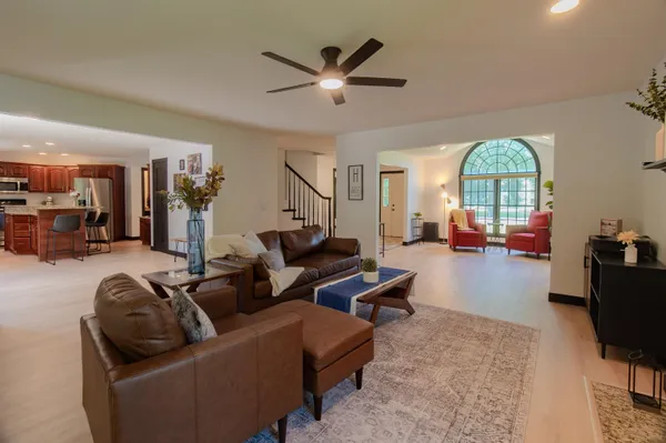 a living room with furniture and a window