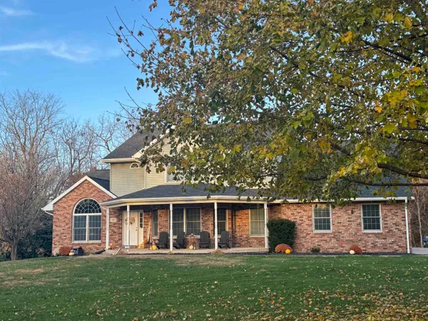 a view of backyard with green space