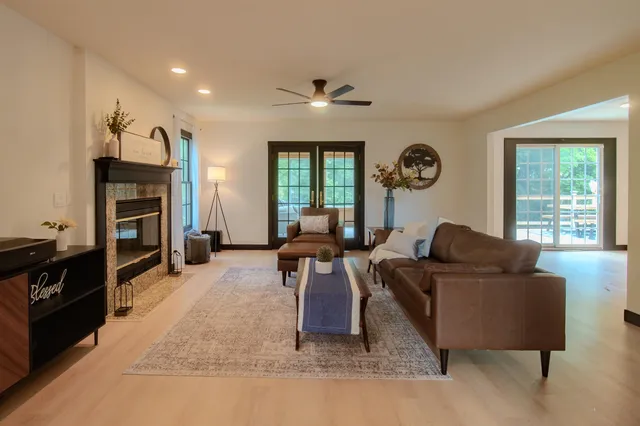 a living room with furniture and a window