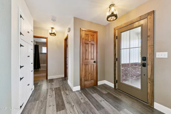 an empty room with a empty space and a window