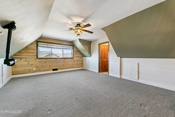 a view of a hallway to a bedroom