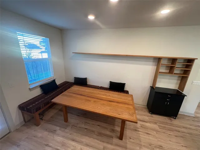 a room with furniture and window