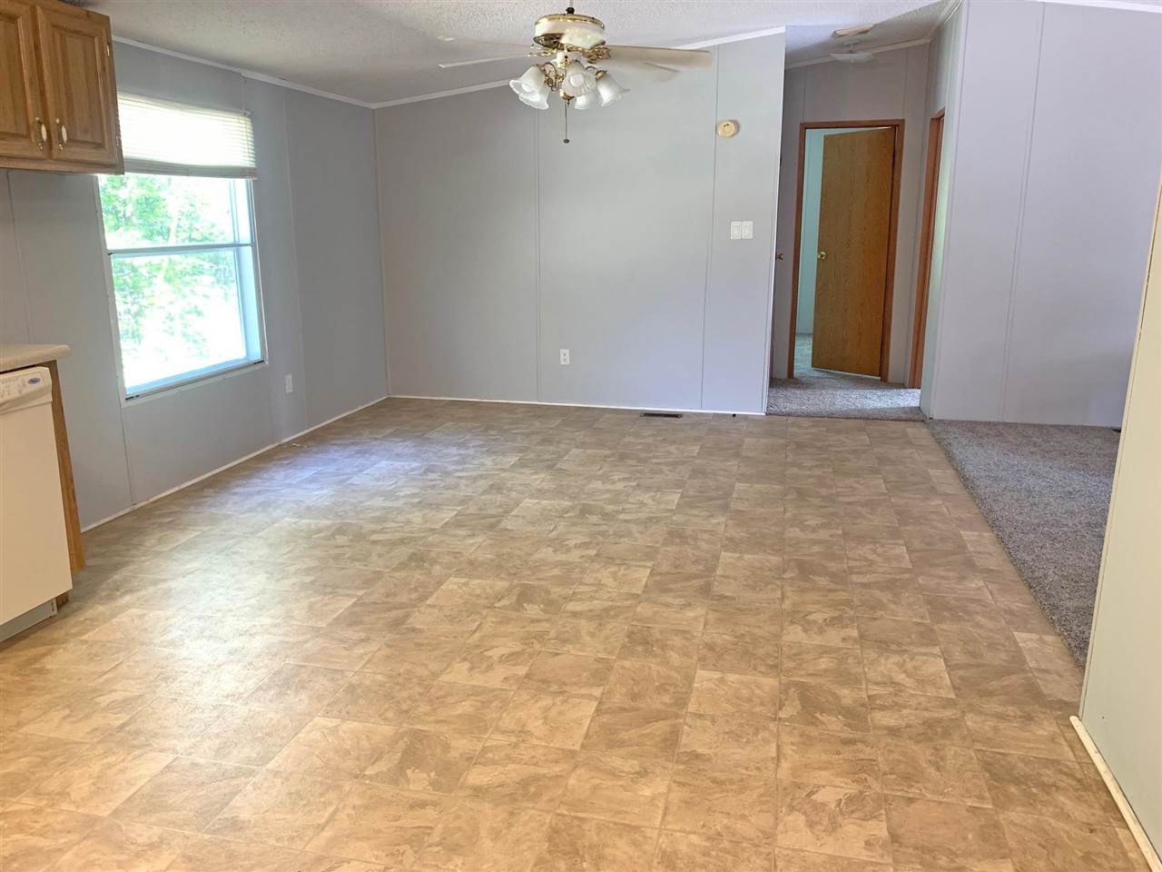 2176 Puron Road Adamsville, TN 38310 - Photo 3 of 24 a view of a livingroom with a chandelier