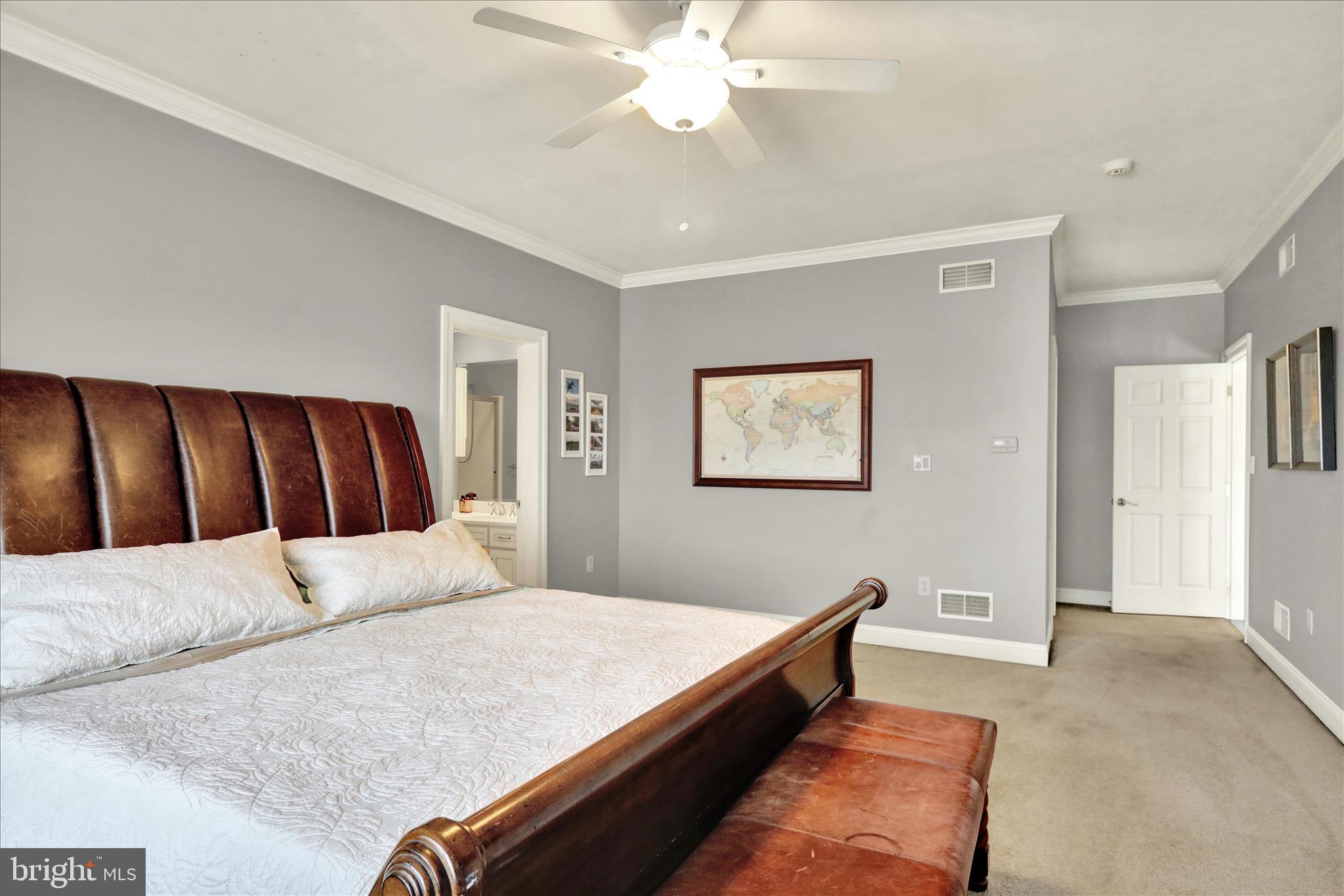 1000 Bluestone Drive Lititz, PA 17543 - Photo 86 of 132 a bedroom with a large bed and a chandelier