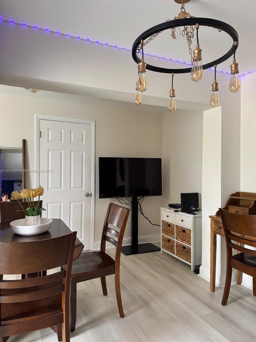 1301 Grouper Drive, Unit B Marathon, FL 33050 - Photo 13 of 39 a living room with furniture and a flat screen tv