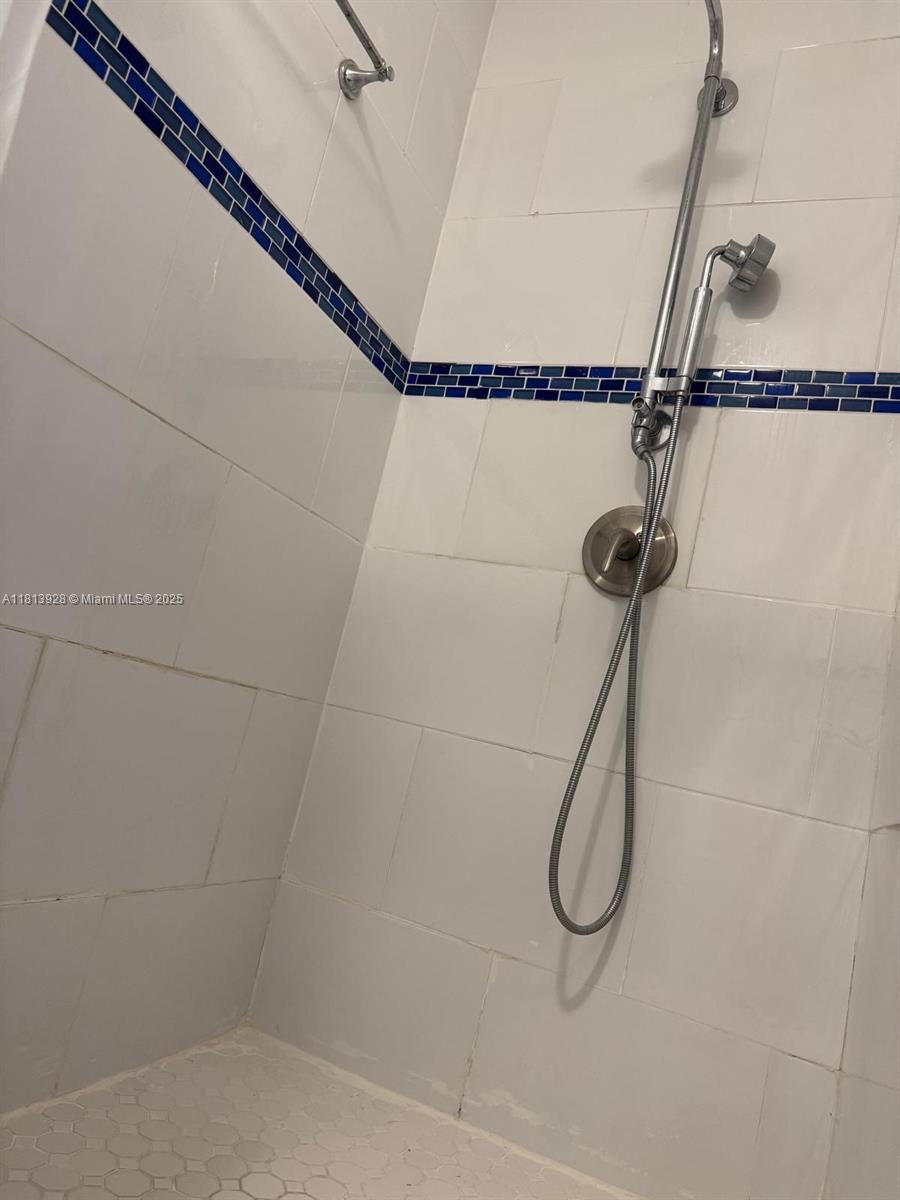 1301 Grouper Drive, Unit B Marathon, FL 33050 - Photo 14 of 39 a bathroom with a shower