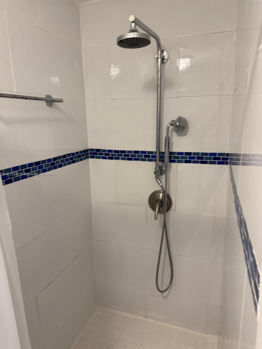 1301 Grouper Drive, Unit B Marathon, FL 33050 - Photo 18 of 39 a bathroom with a shower view and a shower