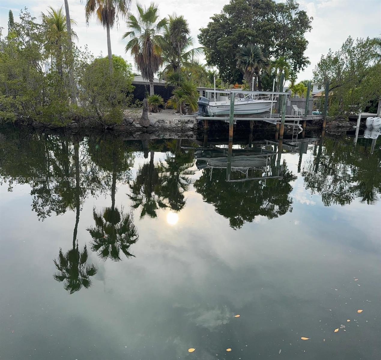 1301 Grouper Drive, Unit B Marathon, FL 33050 - Photo 26 of 39 a front view of a house with a yard