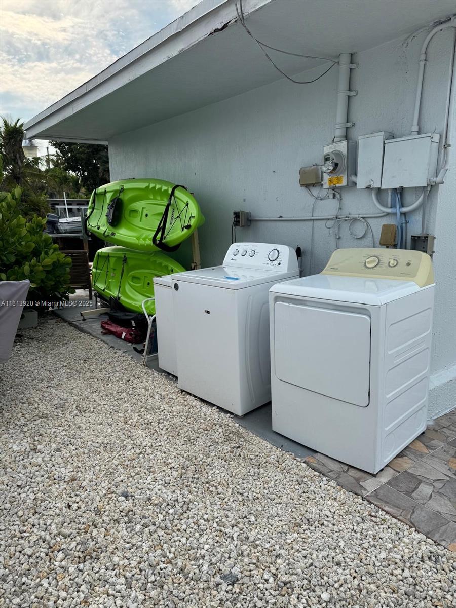 1301 Grouper Drive, Unit B Marathon, FL 33050 - Photo 29 of 39 a utility room with dryer and washer