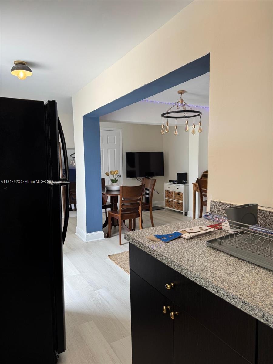 1301 Grouper Drive, Unit B Marathon, FL 33050 - Photo 38 of 39 a kitchen with a refrigerator and a sink