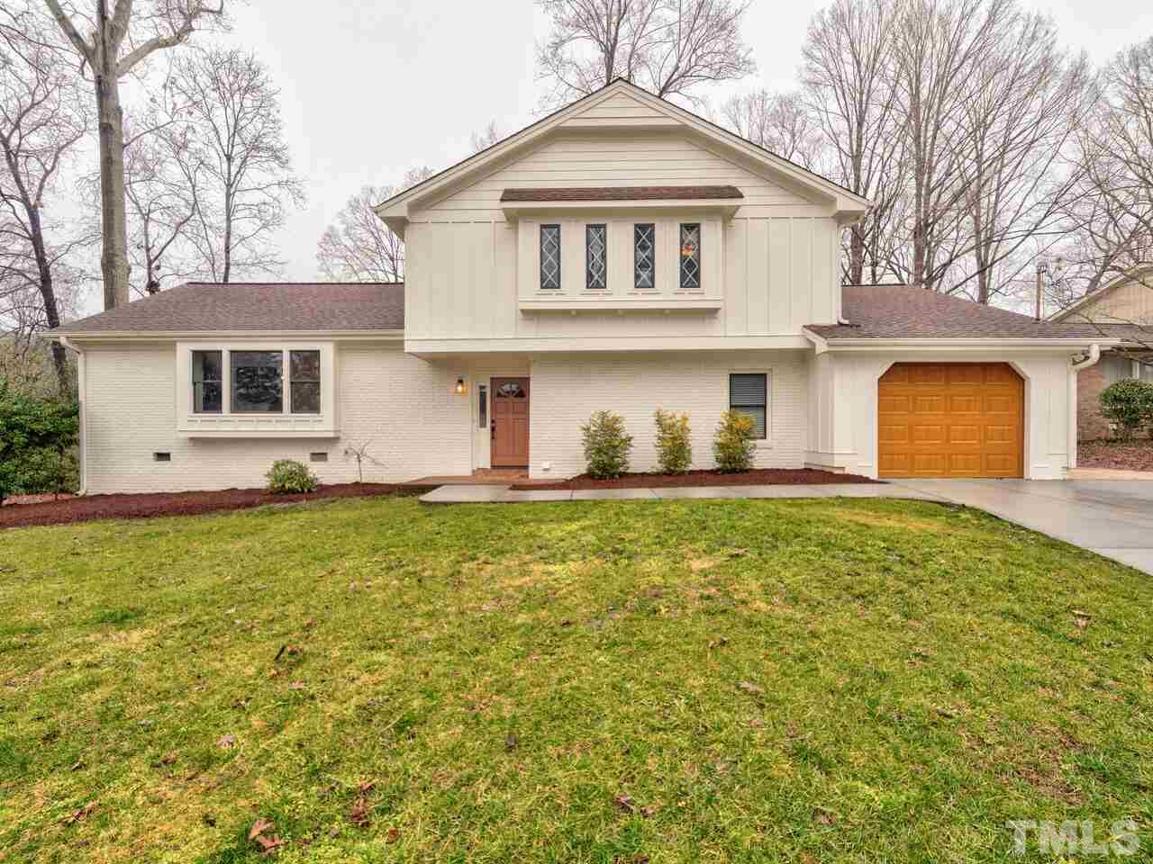 1201 Chardon Court Raleigh, NC 27609 - Photo 1 of 30 a front view of a house with a yard