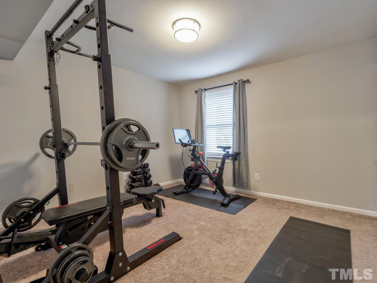 1201 Chardon Court Raleigh, NC 27609 - Photo 24 of 30 a view of a room with gym equipment