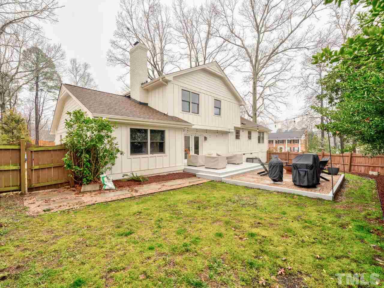 1201 Chardon Court Raleigh, NC 27609 - Photo 27 of 30 a view of a house with swimming pool and sitting area