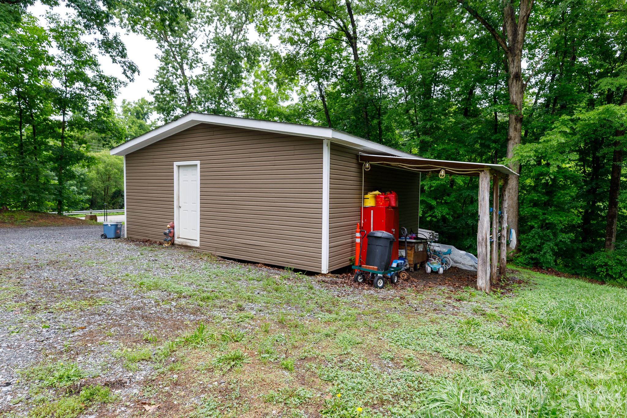 652 Sutton Spring Road York, SC 29745 - Photo 19 of 28 a view of backyard with outdoor seating and deck