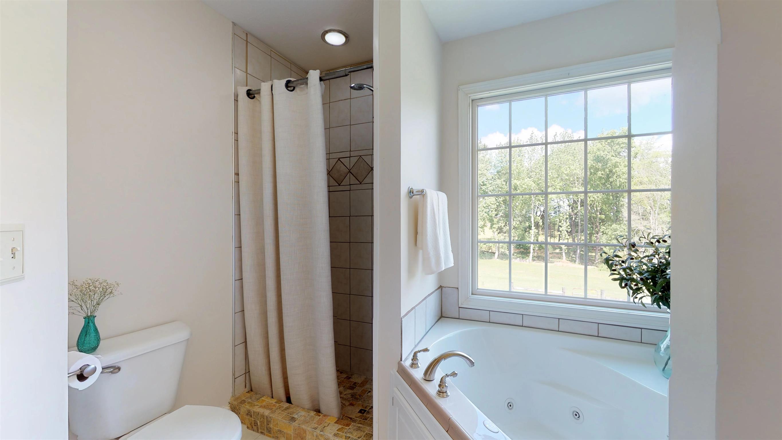 129 Fairfield Road Portland, TN 37148 - Photo 14 of 25 Master shower with decorative tile.
