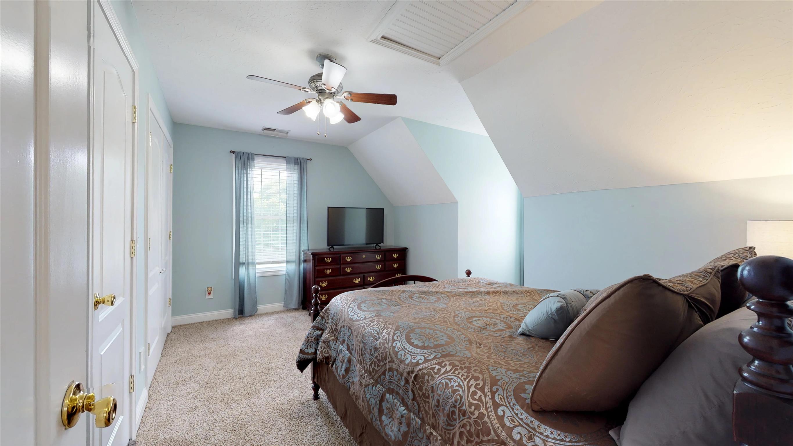 129 Fairfield Road Portland, TN 37148 - Photo 17 of 25 Bedroom 2 upstairs has a beautiful view of the pond.