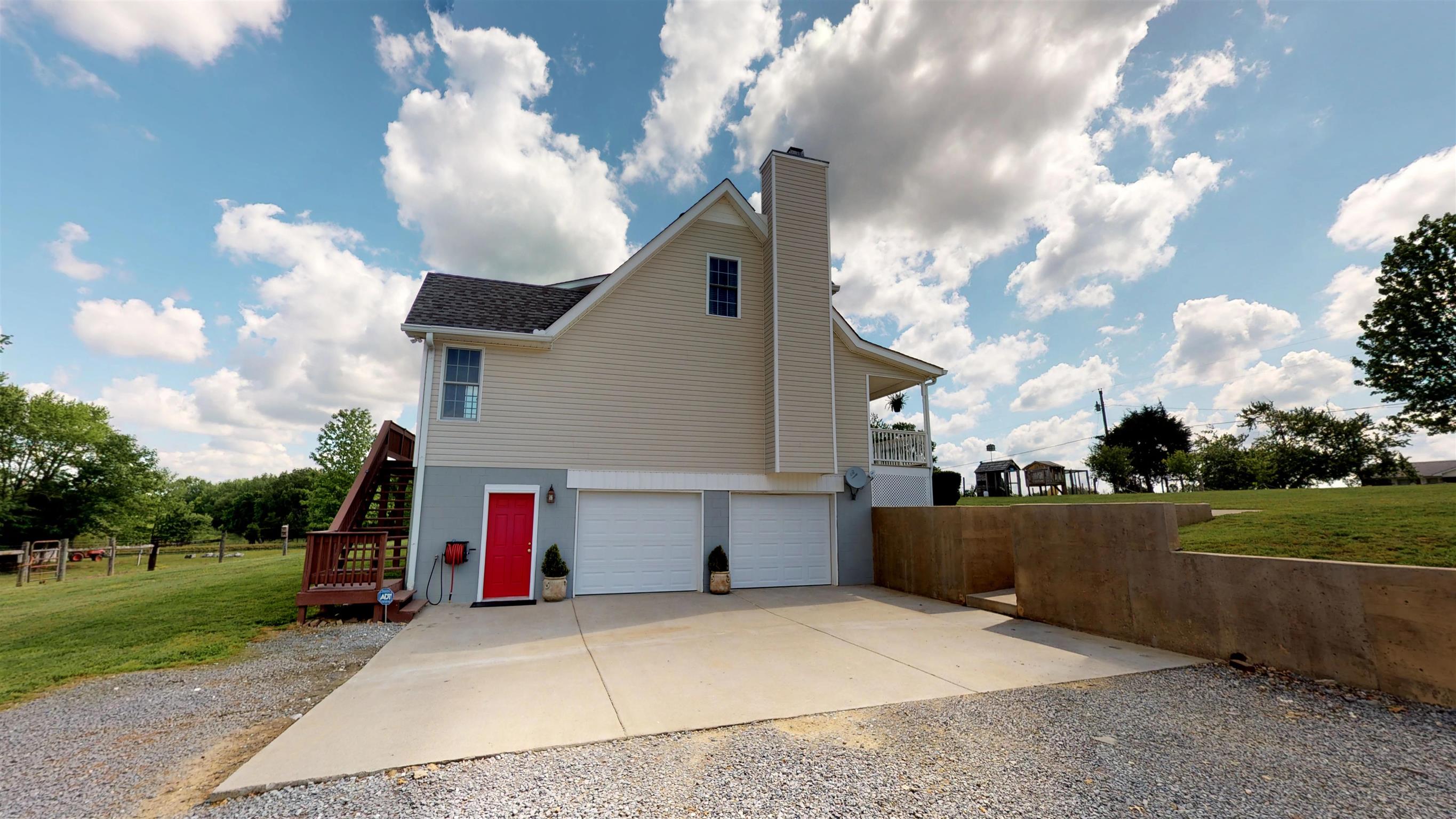 129 Fairfield Road Portland, TN 37148 - Photo 23 of 25 Brand new garage doors, culvert and wall.