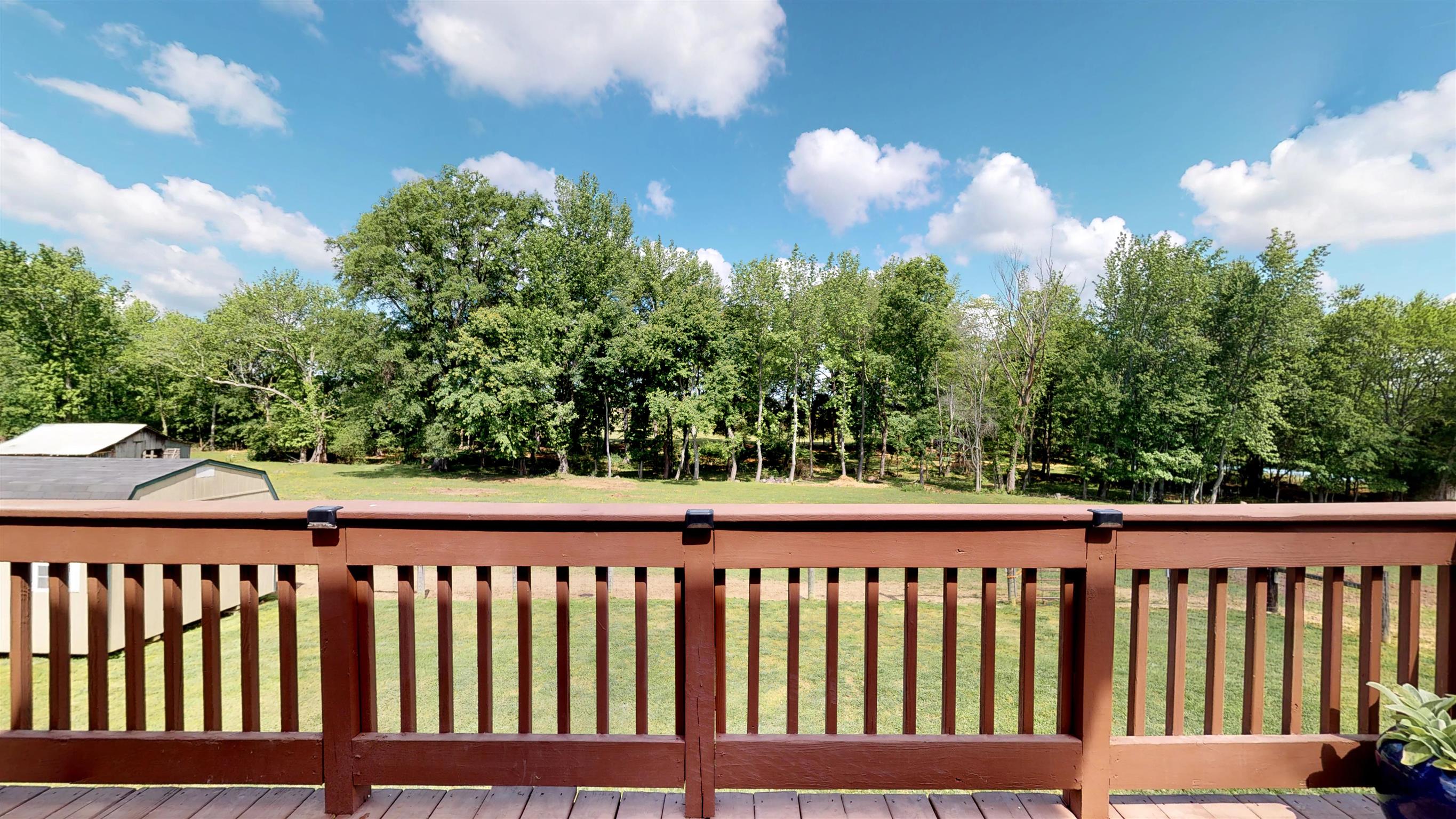 129 Fairfield Road Portland, TN 37148 - Photo 24 of 25 Back deck overlooks the pasture and pond.