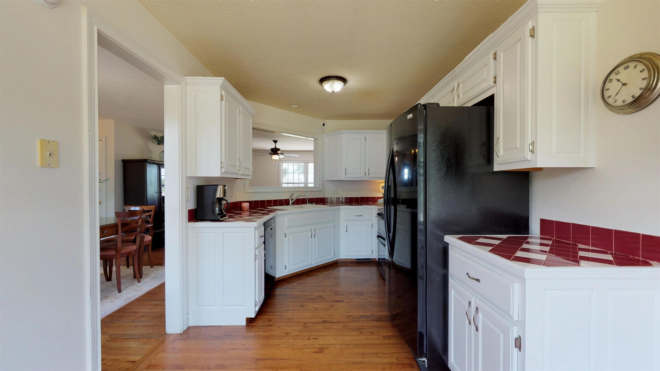 129 Fairfield Road Portland, TN 37148 - Photo 9 of 25 Kitchen has a window that looks out over the living area.