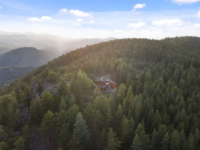 a view of mountain view with mountains in the background