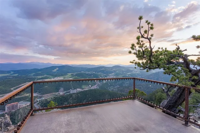 a view of a terrace with a lake view
