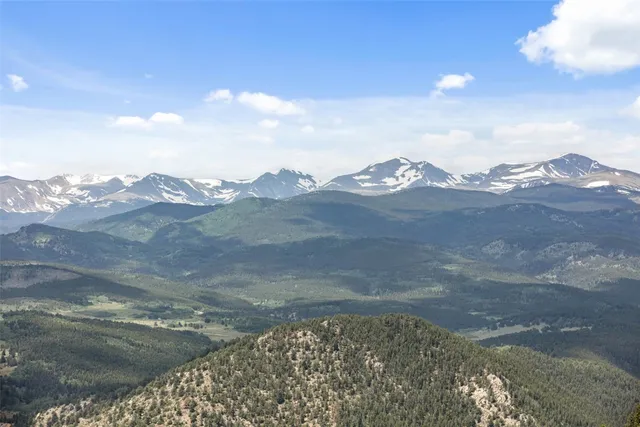 a view of a backyard of a house