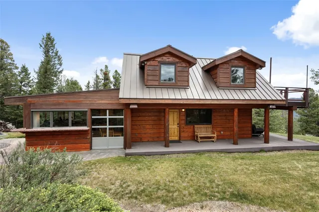 a front view of a house with yard