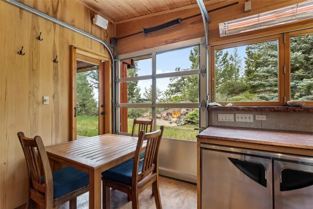 a kitchen with stainless steel appliances granite countertop a stove and a refrigerator