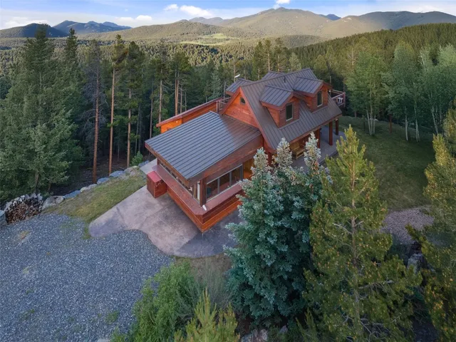 a view of a house with a mountain