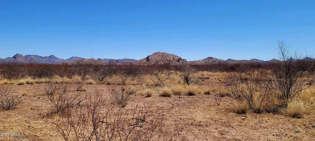 a view of mountain with sunset view