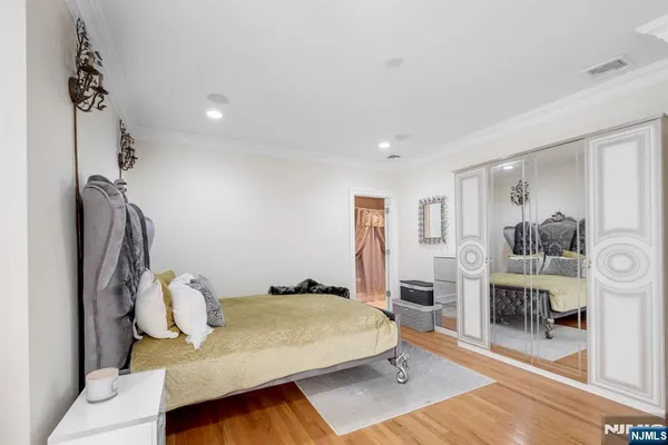 a view of a kitchen with a sink and cabinets