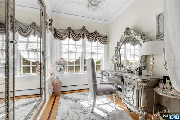 a bathroom with a sink vanity and a mirror