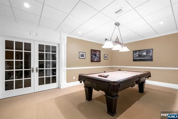a bathroom with a sink toilet and a mirror
