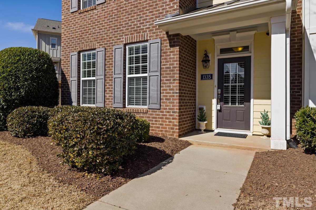 1335 Rodessa Run Raleigh, NC 27607 - Photo 2 of 36 front view of a brick house