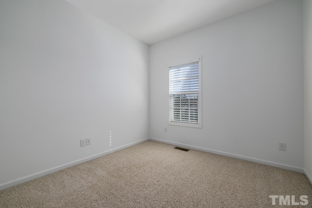 1335 Rodessa Run Raleigh, NC 27607 - Photo 24 of 36 an empty room with a window