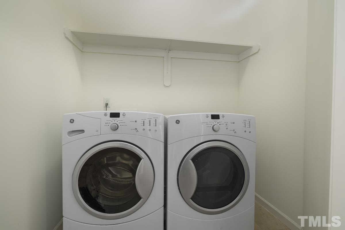 1335 Rodessa Run Raleigh, NC 27607 - Photo 28 of 36 a utility room with dryer and washer