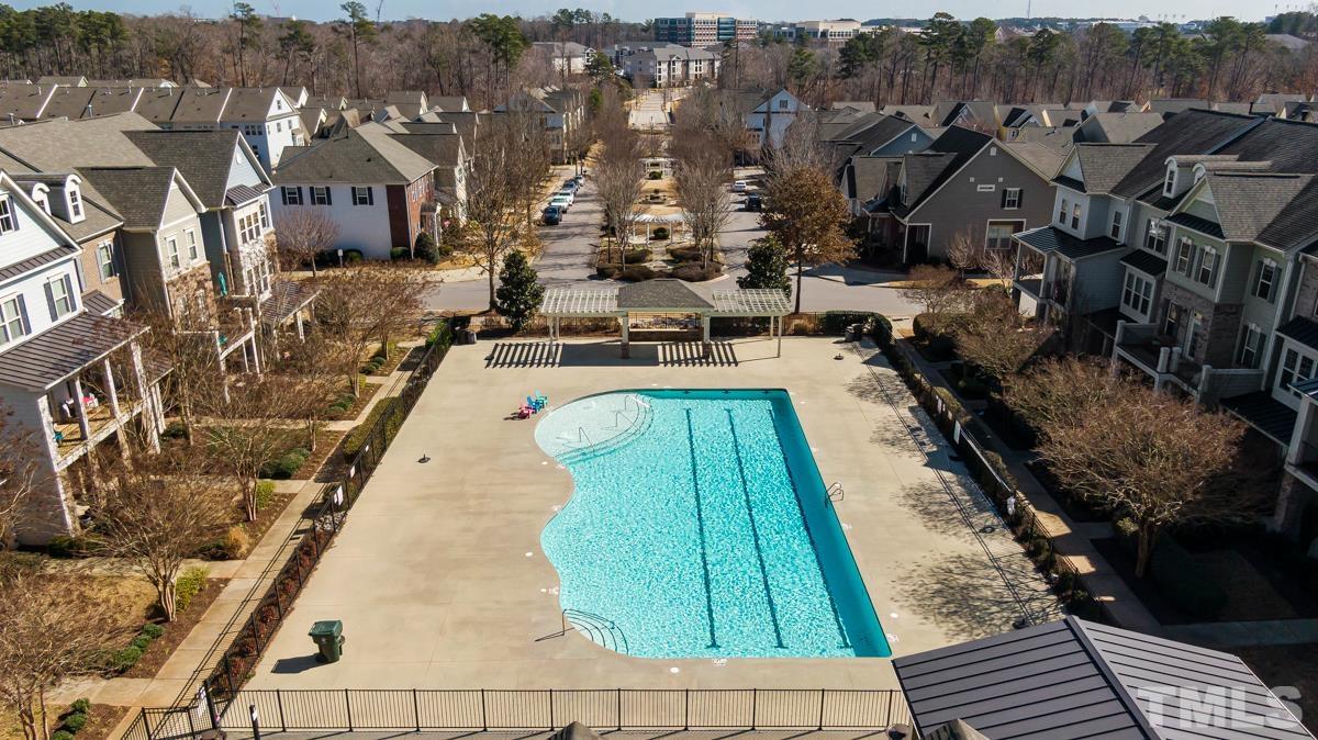 1335 Rodessa Run Raleigh, NC 27607 - Photo 32 of 36 a view of a swimming pool with outdoor seating