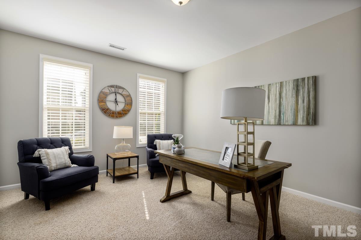 1335 Rodessa Run Raleigh, NC 27607 - Photo 5 of 36 a living room with furniture and a window