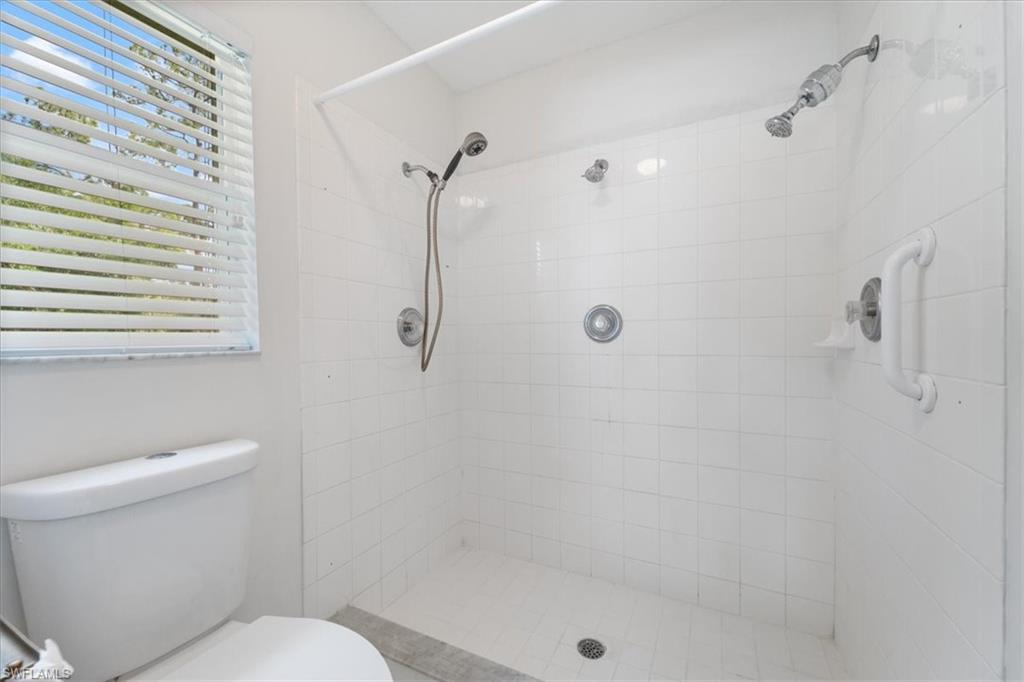 1161 25th Street Southwest Naples, FL 34117 - Photo 14 of 23 a bathroom with a shower and a toilet