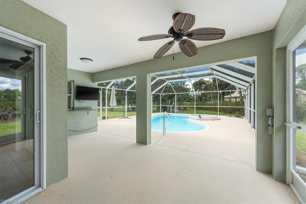 1161 25th Street Southwest Naples, FL 34117 - Photo 16 of 23 a view of an empty room and window