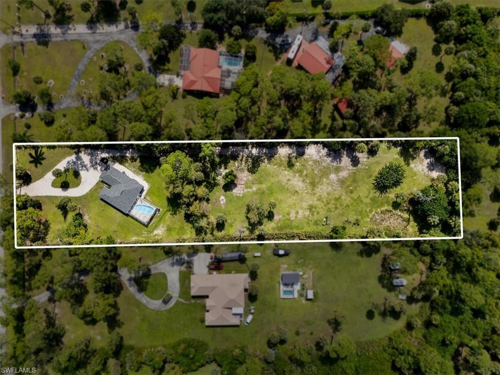 1161 25th Street Southwest Naples, FL 34117 - Photo 21 of 23 a view of city from a balcony